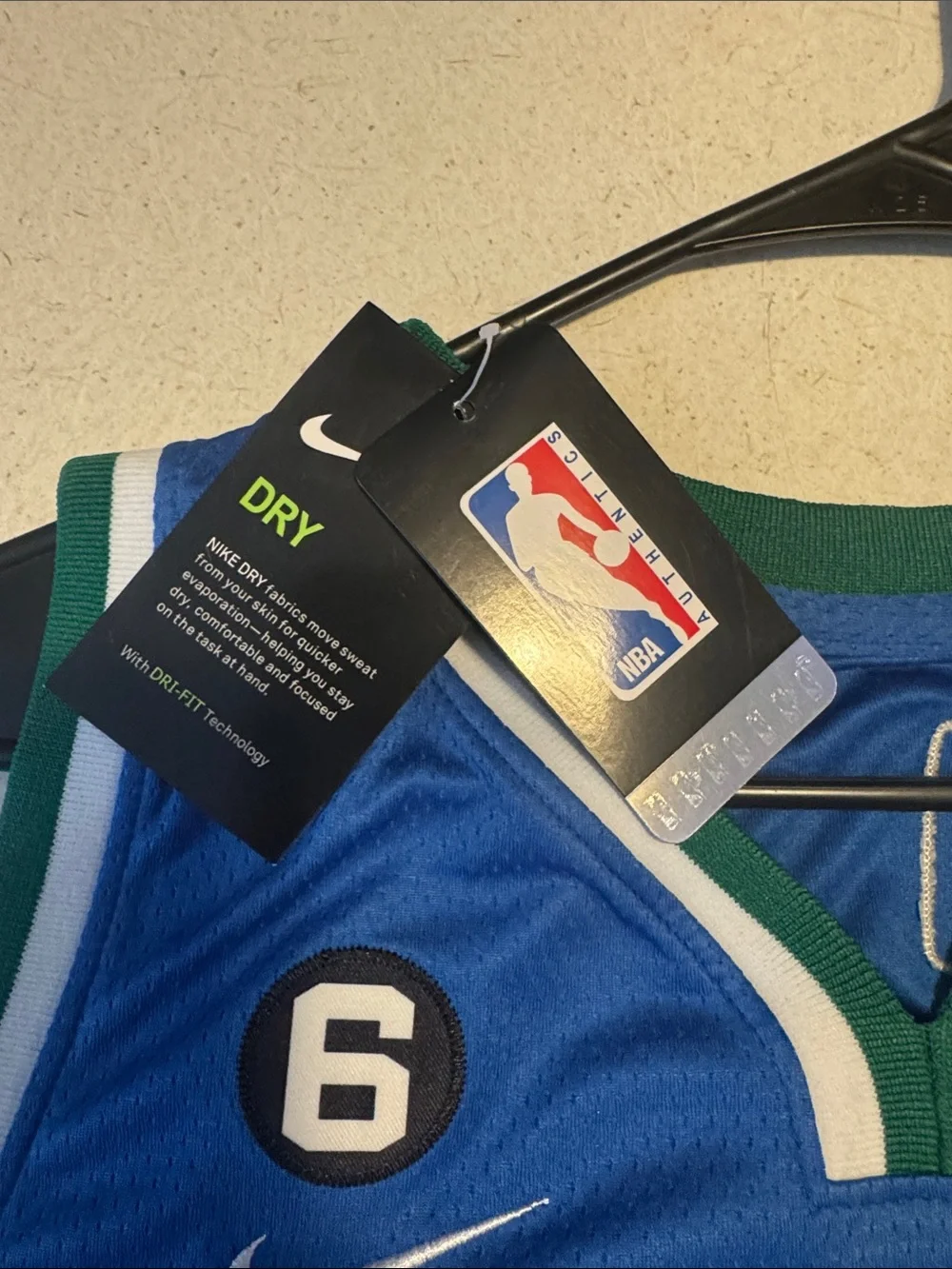 Nike Blue Dallas 77 Luka Dončić Jersey with Green & White Trim